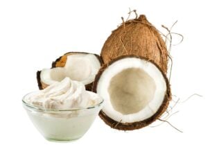 Coconut Cream beside an open coconut fruit