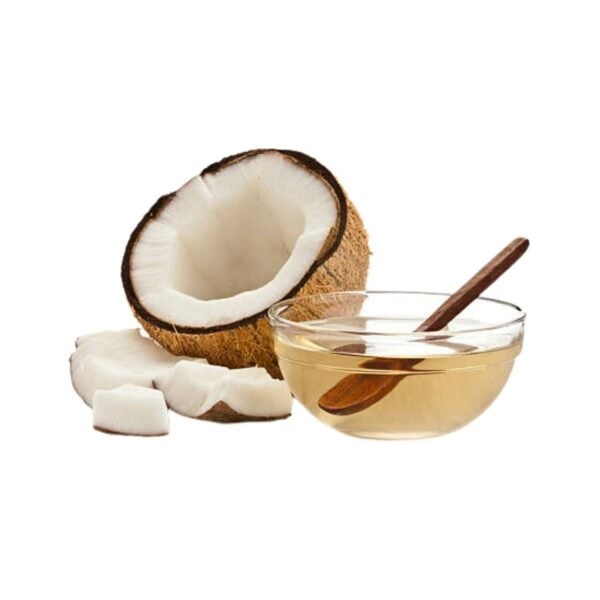 Open coconut revealing white coconut flesh Next to a transparent bowl of coconut oil.