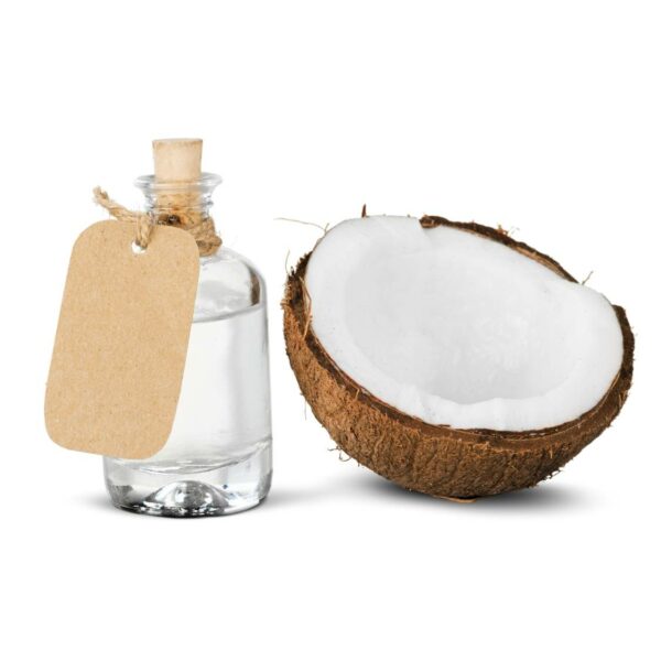 Coconut together with a coconut Oil bottle