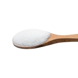 Sugar-like powder on a spoon