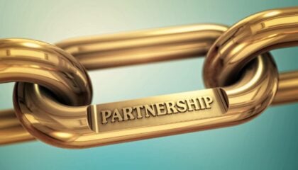 A golden chain that says Partnership