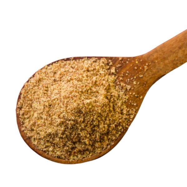 Ground flaxseed on a wooden spoon