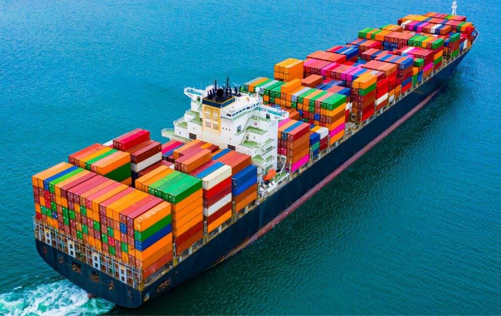 Ship loaded with containers sailing on the high seas