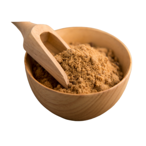 Brown Coconut palm sugar granules in a wooden bowl