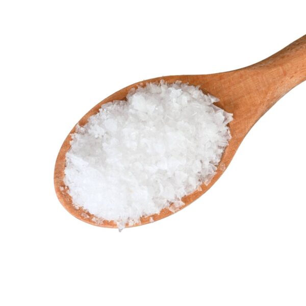 Salt flakes on a wooden spoon