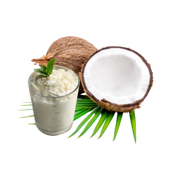 Coconut cream in a glass besides an open coconut fruit.