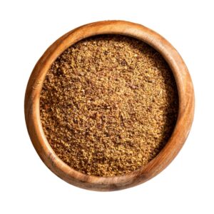 Ground flaxseed in a wooden bowl