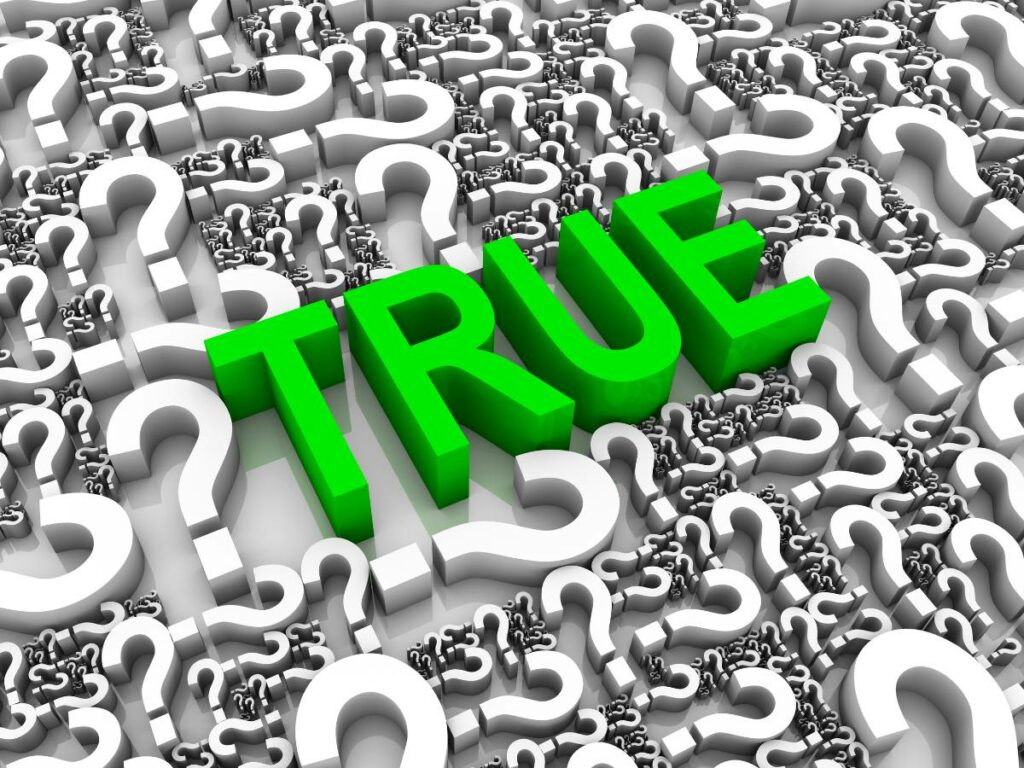 Many white small questions marks and the word "True" written in a bigger sizee and in green