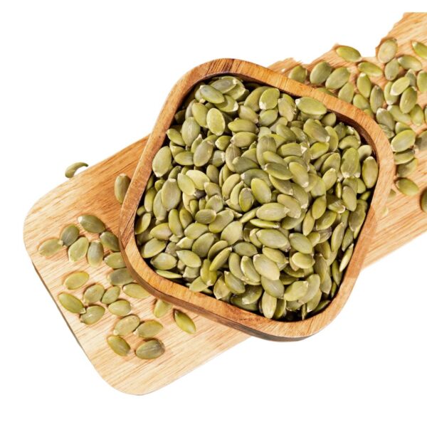 Green seeds in a square , wooden bowl