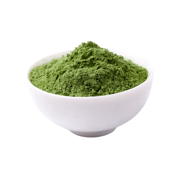 Dark green powder in a white bowl