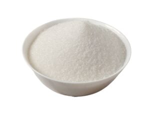 White sugar-like substance in a white bowl.