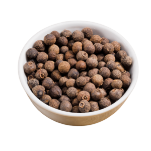 Round, brown beadlike allspice in a white bowl.