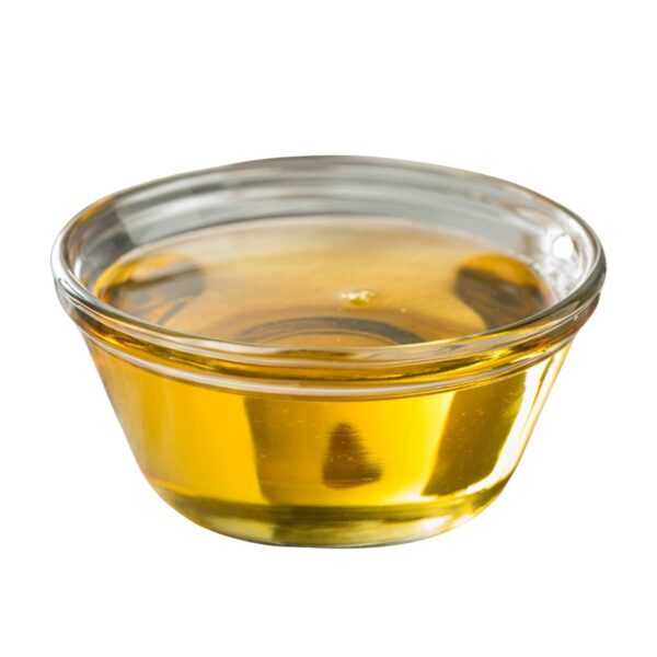 Yellowish syrup in a transparent bowl
