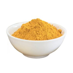 Orange pumpkin powder in a white bowl