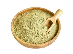 Top view of green powder in a bowl