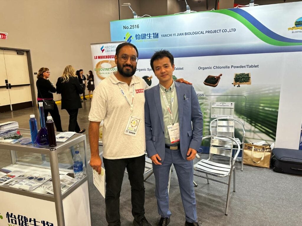 Aalap, Ingredient Brothers co-founder and COO and Yanchi's representative together in SupplySide West