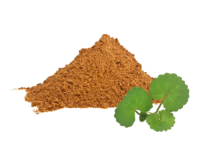 brown powder in a heap beside a green leaf