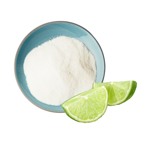 Top view of a white powder displayed with some lime slices.
