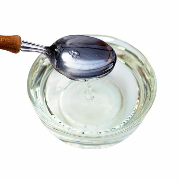 Top view of clear syrup in a bowl.