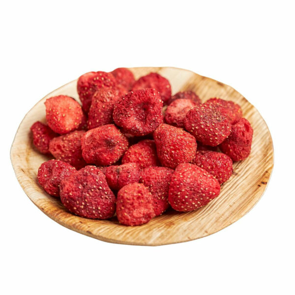 Dried strawberries on a wooden bowl
