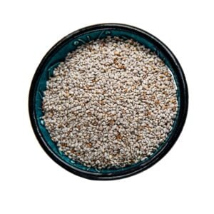 Top view of white chai seeds in a bowl