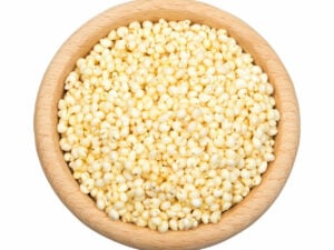 Top view if yellowish grains in a bowl.