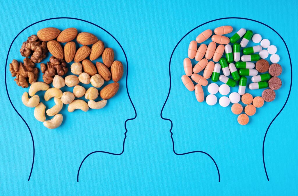 two heads with different types of nuts and pills in them