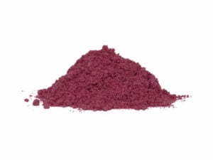 Purple-red powder in a heap.