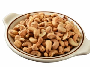 Roasted Cashew nuts on a plate.